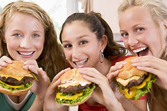 Teenagers Eating Burgers