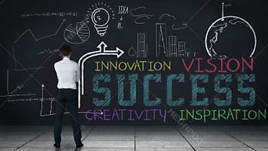 Businessman looking at graphs on interface