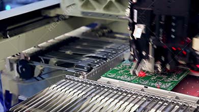 Surface Mount Technology Machine places elements on circuit boards