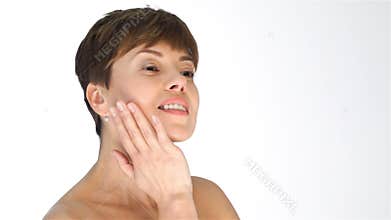A woman in age with a resilient face skin
