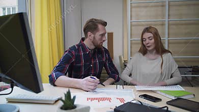 Man shows the new trends of the market employee.