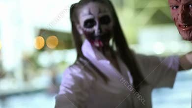 Young people in costume Halloween party