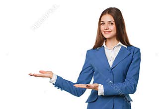 Smiling woman showing open hand palm with copy space for product or text. Business woman in blue suit, isolated over white backgro