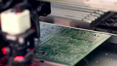 Automated electronics parts manufacturing line. Citcuit board production.