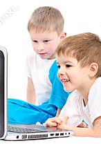 Children looking on laptop screen