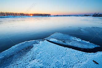 The rivers covered with ice sunset