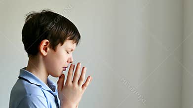 Boy teen praying belief in god