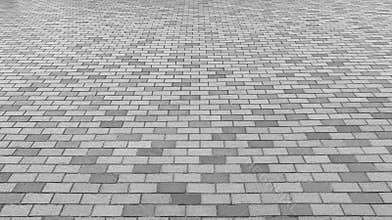 Perspective View of Monotone Gray Brick Stone Street Road. Sidewalk, Pavement Texture