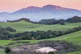 Sunset over Rolling Grassy Hills and Diablo Range of Northern California