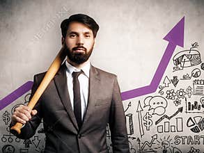 Businessman holding baseball bat