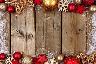 Red and gold Christmas double border with snow on wood