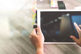 Website designer working blank screen digital tablet and books w