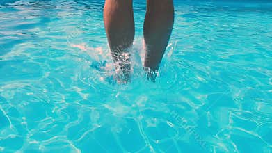 Man diving in swimming pool