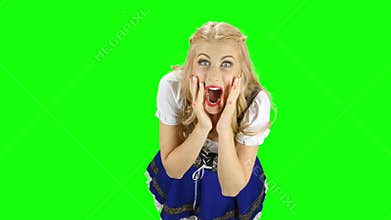 Bavarian woman something really admires the one in the room. Green screen