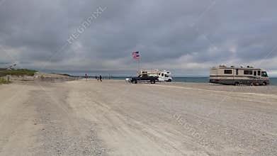 Caravan on the empty beach on the Cape Cod