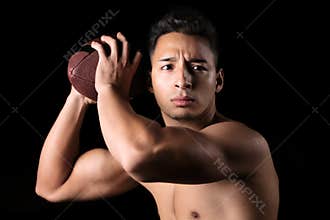 Football player ready to throw the ball