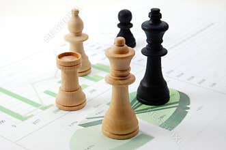 Chess man over business chart