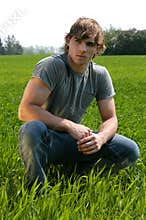 Young Man at the Green Grass