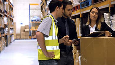 Coworkers having discussion on checklist