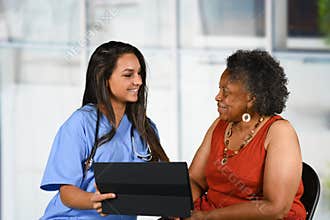 Health Care Worker and Elderly Woman