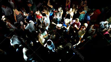 Strobe flash and colored lights on crowd