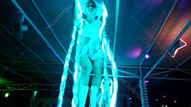 Girl dancing in neon lights