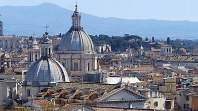 Panoramic view on the rooftops of Rome, Italy. Rome skyline. Panning shot.