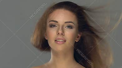 Beautiful young woman face close-up.