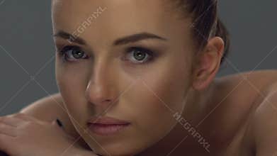 Beautiful young woman face close-up.