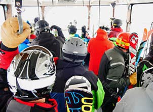 Crowded inside the ski gondola