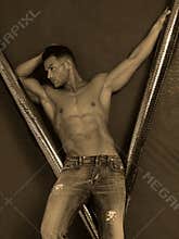 Artistic male in jeans
