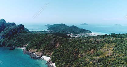 Aerial drone video of Andaman sea and limestones, shot done behind iconic tropical beach and resorts of Phi Phi island