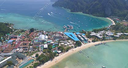 Aerial drone video of iconic tropical beach and resorts of Phi Phi island