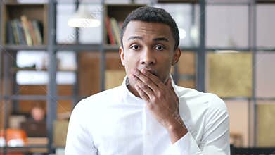 Shocked Black Man in Office