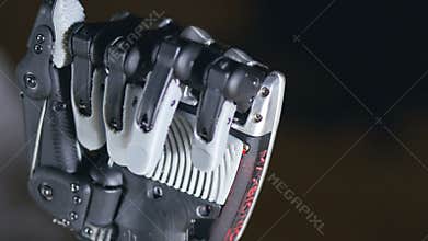 Futuristic robotic cyborg arm in action. Real robotic prosthesis.
