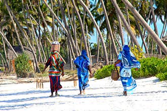 Zanzibar women on sandy beach