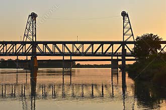 Historic bridge reflections and silhouette