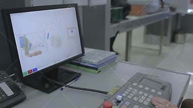 Checking the suitcase with x-ray scanner in the airport