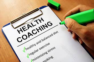 Clipboard with health coaching list.