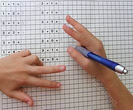 School girl learning maths with fingers