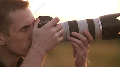 Photographer at sunset