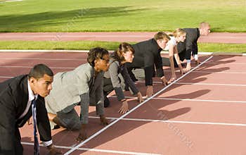 Business People Crouching at Track Starting Line