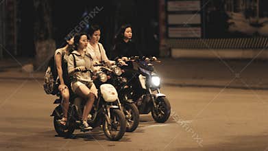 Women riding motorbikes