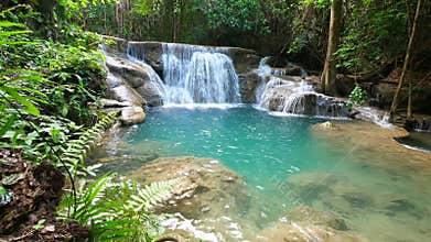Dolly shot of deep forest waterfall, Kanchanaburi, Thailand