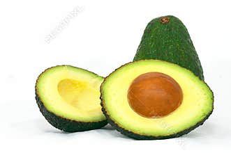 Green Avocado with cut avocado