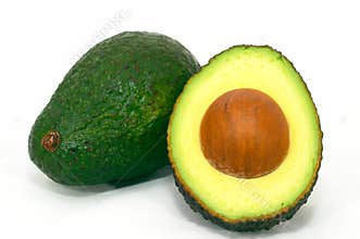 Green Avocado and cut avocado