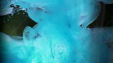 Blue paint hitting water