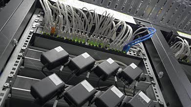 Storage servers are located in the server room of the data center. Back of the server installed in the server room. Many