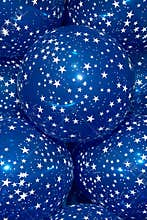 Blue balloons with white stars