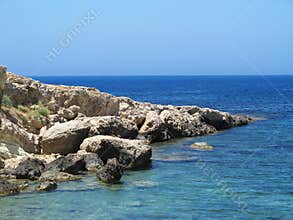 Clear azure sea water landskape and rocks near Crete coast, Gree